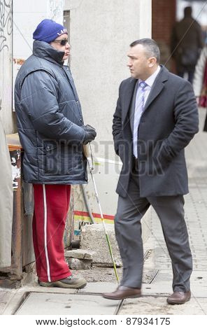 Blind Man Begging