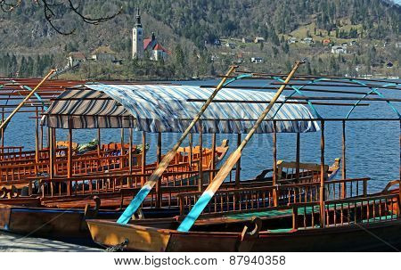 Rowboats Moored On The Shore Of Lake Bled In Slovenia