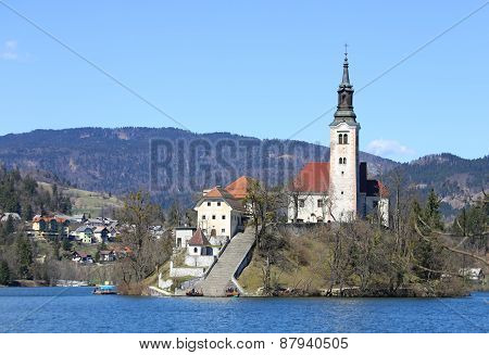 Church With A High Bell Tower On The Island On Lake Bled In Slovenia In Europe