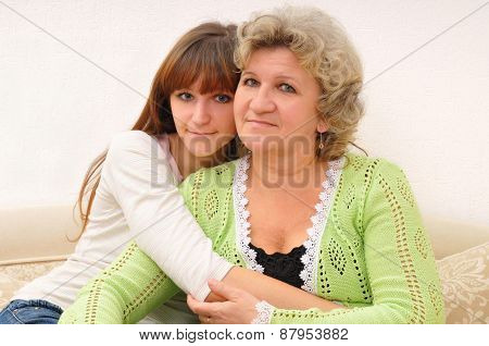 Doughter Hugs Mother
