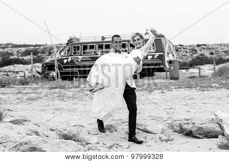 Beautiful  Gorgeous Blonde Bride  And Stylish Groom, On The Background Of Decorated Bus, Ceremony