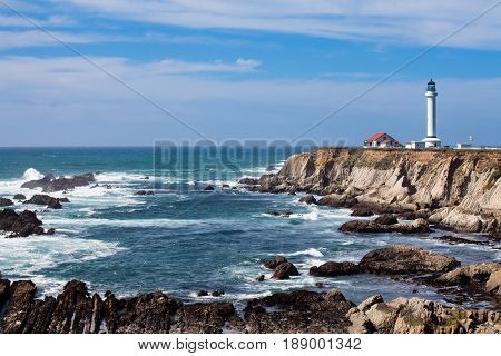 Pacific Ocean coastal landscape with Point Arena Lighthouse California CA USA