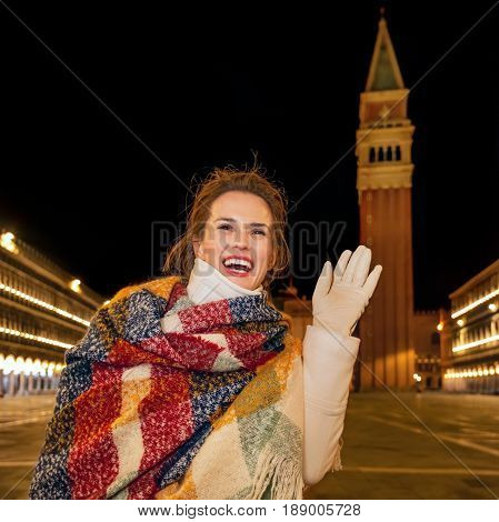 Woman At Piazza San Marco Handwaving Near St Mark's Campanile