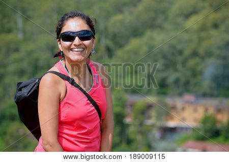 Beautiful happy woman walking the yungas jujeñas, argentina