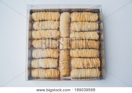 Baklava is a Middle-Eastern dessert. It is a rich, sweet pastry made of layers of filo filled with chopped nuts