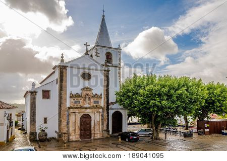 OBIDOS,PORTUGAL - MAY 11,2017 - Church of Santa Maria in Obidos town. The area of the town of Obidos is located on a hilltop encircled by a fortified wall.
