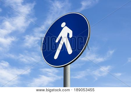Pedestrian lane road sign on blue sky background