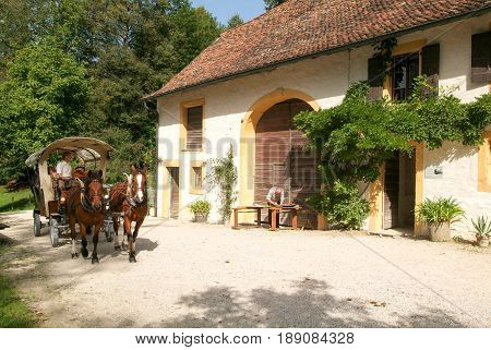 People Visiting On Tourist Buggy  Old Farm Houses