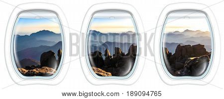 Three porthole frame windows of the holy summit of Mount Sinai, Aka Jebel Musa, 2285 meters, at sunrise, Sinai Peninsula in Egypt.