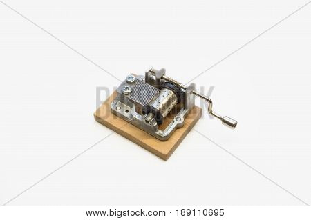 Closeup image of isolated small barrel organ on white background.