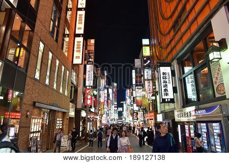 SHINJUKU - MAY 28: Japanese and tourists walking shopping at Shinjuku (large entertainment business and shopping area around Shinjuku Station) on May 28 2017 at Shinjuku in Tokyo Japan.
