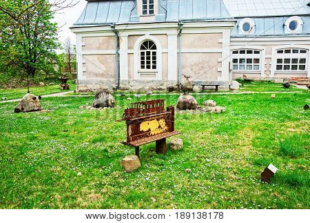 Vilnius, Lithuania - September 3, 2014: Rusty metal figures at Traku Voke public park in Vilnius Lithuania.