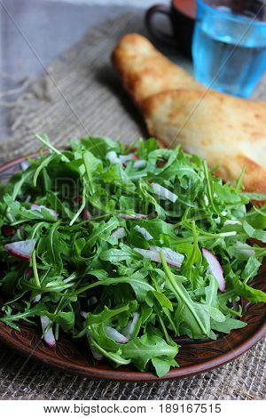 Healthy food delivery. Fitness food. Weight loss nutrition diet. Eat right concept, healthy food, clean food. Fresh salad from lettuce leaves and bread.