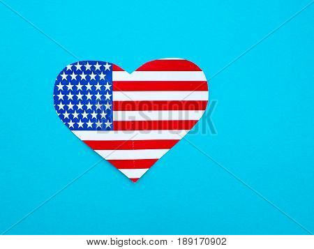 American flag in the shape of a heart on bright yellow background USA independence day