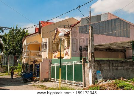 Local Street With Houses In The Philippines Capital Manila