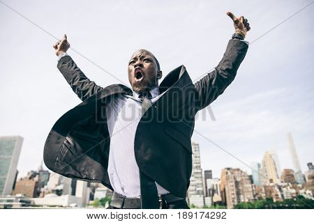 Confident happy businessman exulting - Happy man