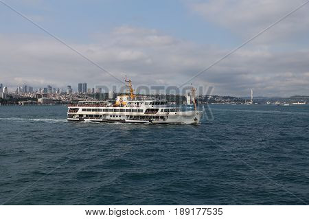 ISTANBUL TURKEY - MAY 27 2017: Sehir Hatlari ferry in Bosphorus Strait. Sehir Hatlari was established in 1844 and now carry 150000 passengers a day.