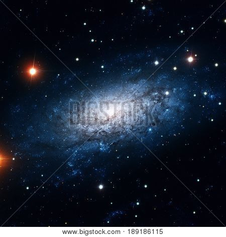 NGC 3621 is a field spiral galaxy in the constellation of Hydra. Retouched colored image. Elements of this image furnished by NASA.