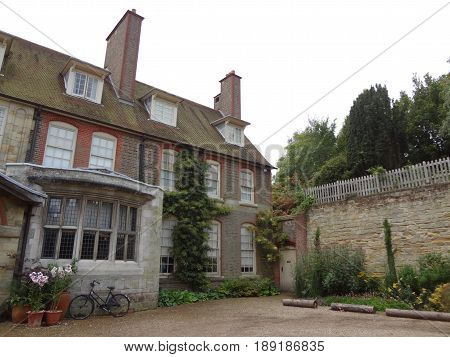 An old English building and garden in West Sussex, England. United Kingdom.