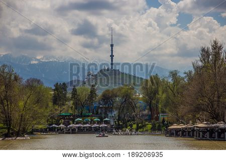 Central City Park, Almaty, Kazakhstan. View Of The Lake And Kok Tobe Hill
