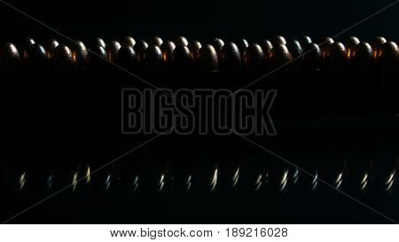 9mm bullets on the black mirror background