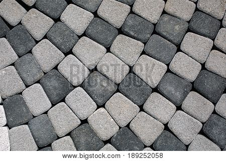 Stone path at the old town in Europe. Texture close up.