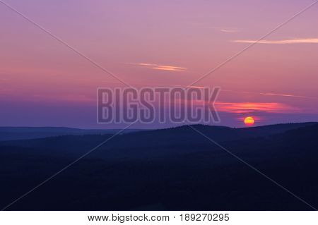 Mountains and fog at sunrise. Nature Background