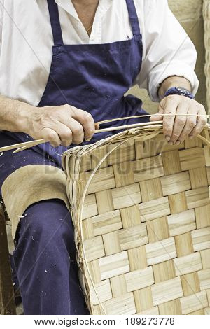 Craftsman Making Baskets