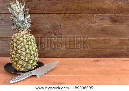 Ripe Anans On A Wooden Table And Background Texture With Free Space For Writing
