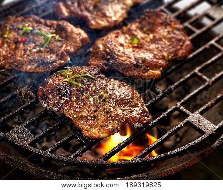Grilled pork neck steak. Roast pork while grilling