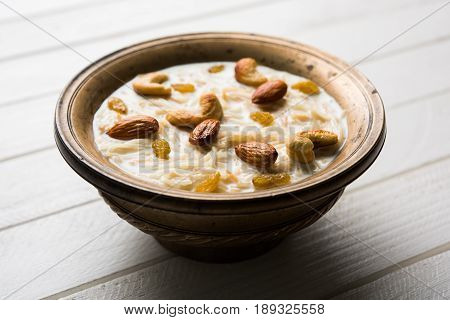 Most famous Indian sweet pudding Kheer or semiya khir in a bowl.Selective focus