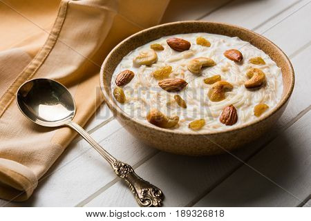 Most famous Indian sweet pudding Kheer or semiya khir in a bowl.Selective focus