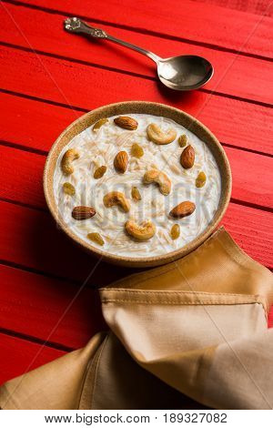 Most famous Indian sweet pudding Kheer or semiya khir in a bowl.Selective focus