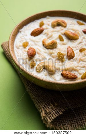 Most famous Indian sweet pudding Kheer or semiya khir in a bowl.Selective focus