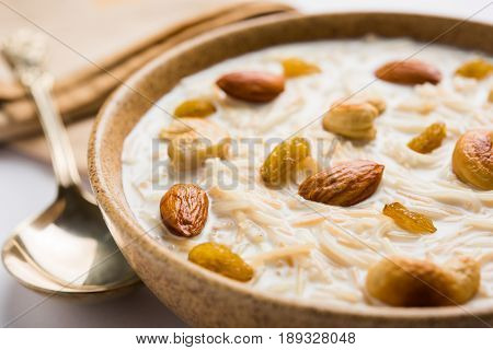 Most famous Indian sweet pudding Kheer or semiya khir in a bowl.Selective focus