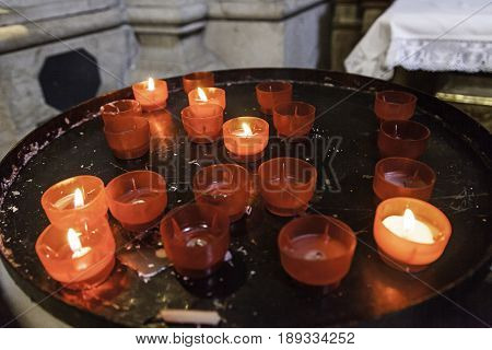 Burning Candles In A Church