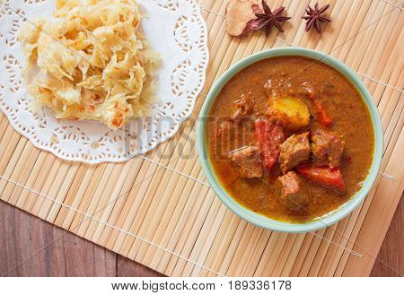 Beef Mussaman Curry Eat With Roti On Wood Background Top View
