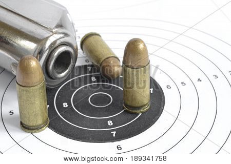 Pistol and ammunition on the white background.