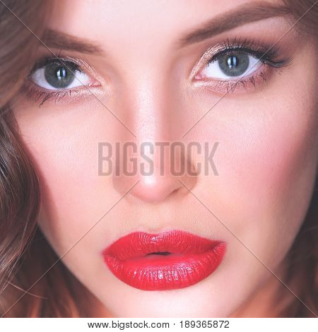 Beautiful woman skin with red lips on white background