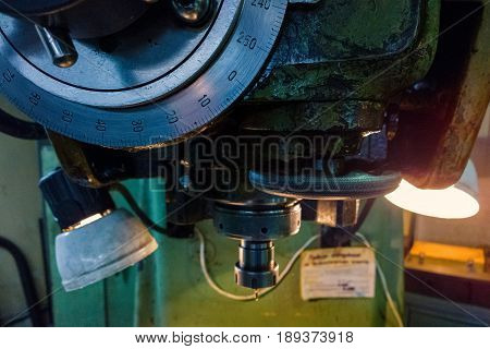 dark controls of manual milling machine closeup