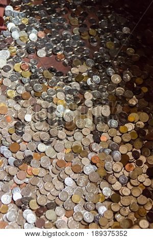 Golden coin and nickel coin or golden coin and nickel coin background.