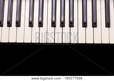 Piano Keys On Wood Blurry Background For Copy Space