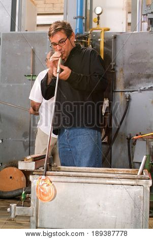 Workers During The Glass Processing