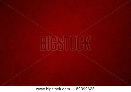 Red dark background with liight center. Red texture.