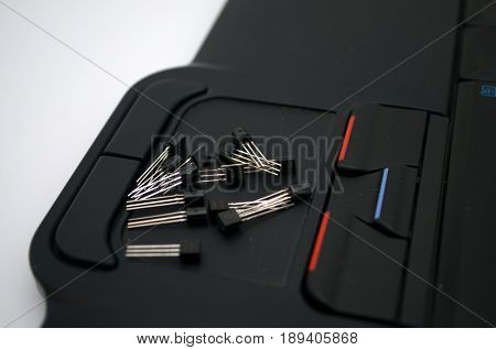 Transistors arranged on a laptop touch mouse