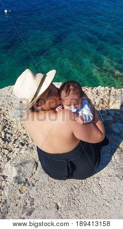 mum and baby on the beach, Malta, Mellieha