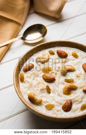 Most famous Indian sweet pudding Kheer or semiya khir in a bowl.Selective focus
