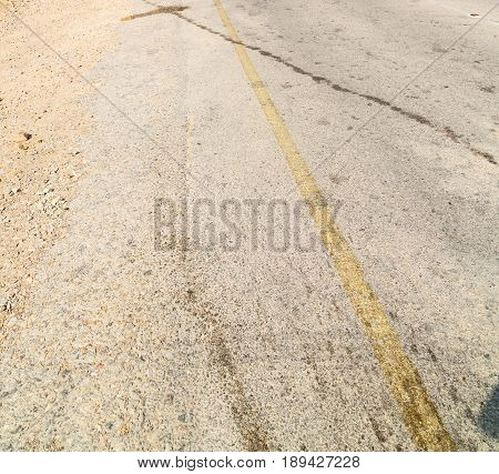 In Oman Asphalt Street White Line And Mountain Panorama