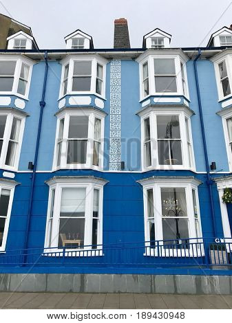 Painted blue four storey townhouse