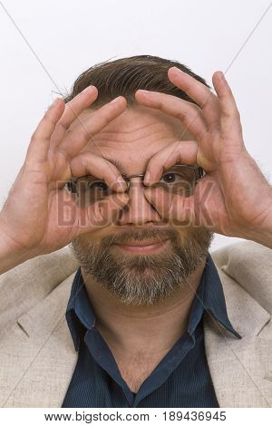 Young Man focussing the future - on bright background
